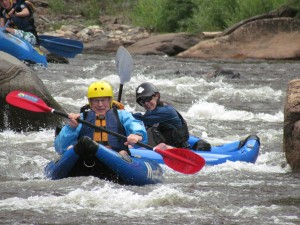 Cass (Black helmet) guides a ducky trip. 