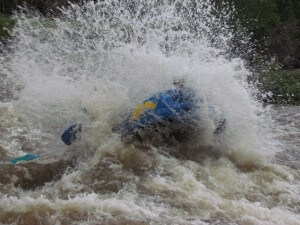 Big wave splash on the Cache la Poudre River with Mountain Whitewater