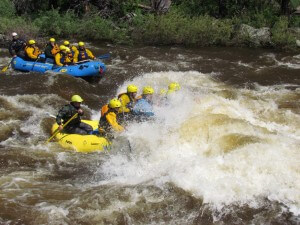 Rafting through Guide Hole Rapid on the Cache La Poudre River