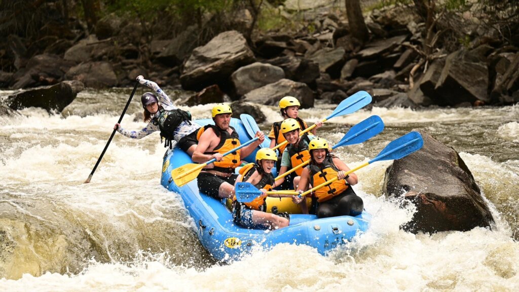 Paddlers successfully navigate the largest rapid on the river, pine view